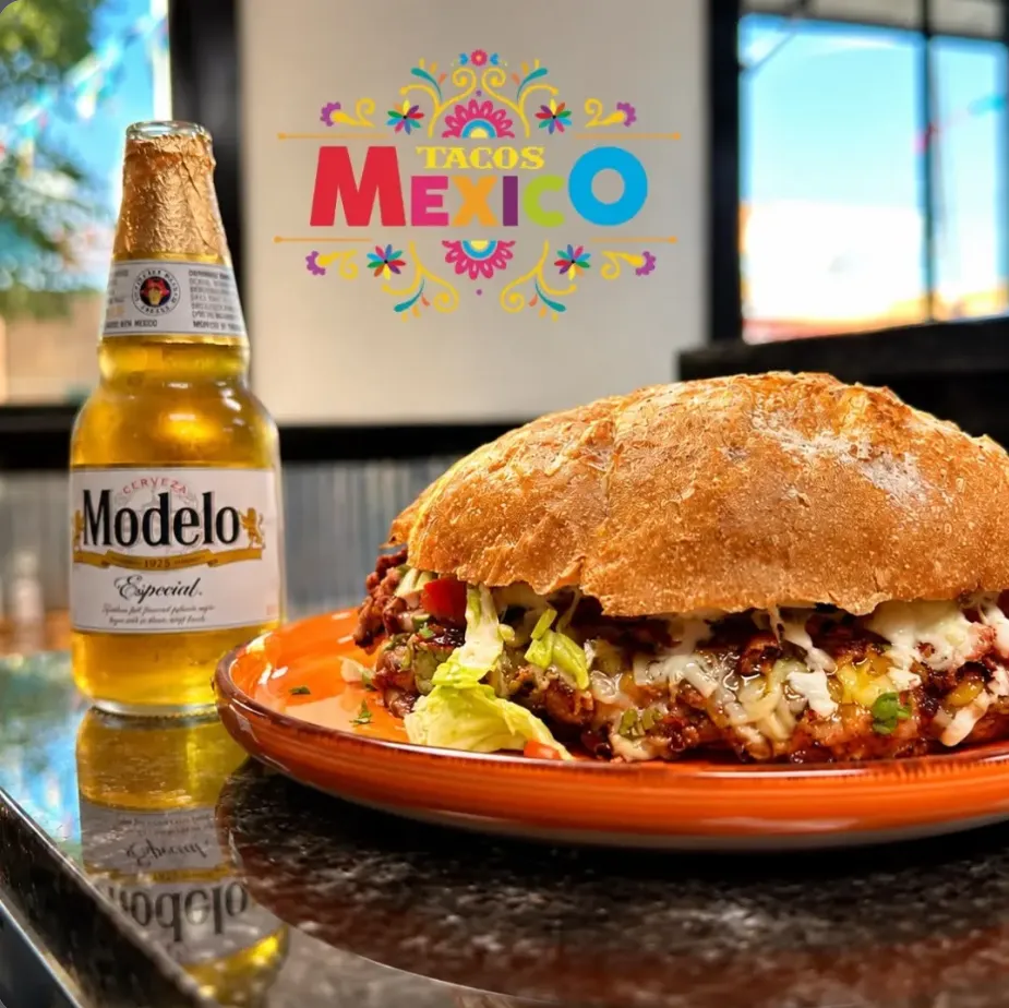 Tacos México signature Super Torta served on an orange plate